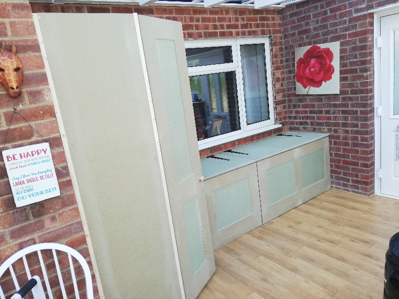 Storage cupboard and storage box for conservatory.